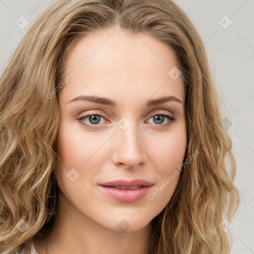 Joyful white young-adult female with long  brown hair and green eyes