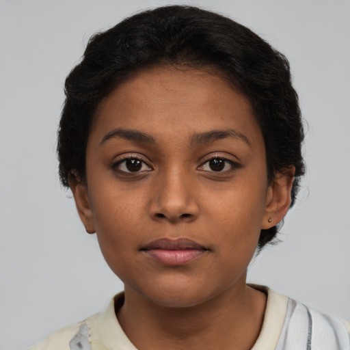 Neutral latino young-adult female with short  brown hair and brown eyes