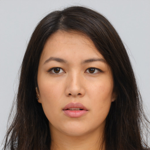 Neutral asian young-adult female with long  brown hair and brown eyes