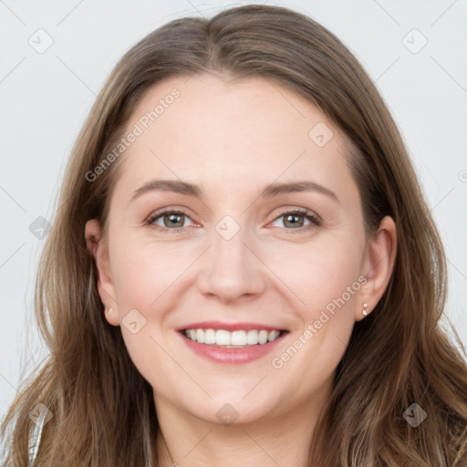 Joyful white young-adult female with long  brown hair and grey eyes