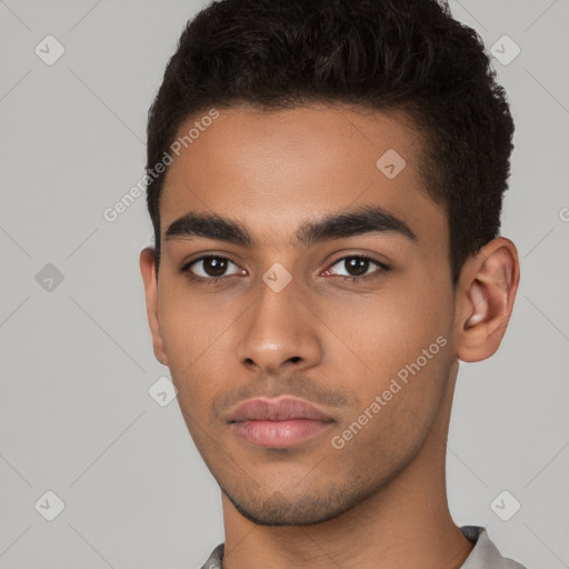 Neutral latino young-adult male with short  black hair and brown eyes