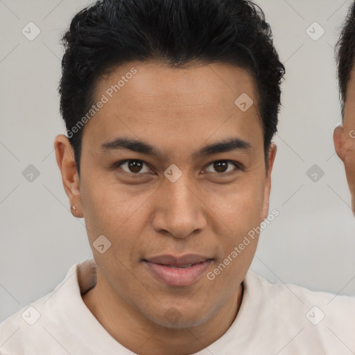 Joyful latino young-adult male with short  brown hair and brown eyes