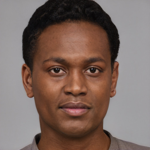 Neutral black young-adult male with short  black hair and brown eyes
