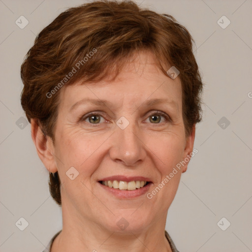 Joyful white adult female with short  brown hair and grey eyes