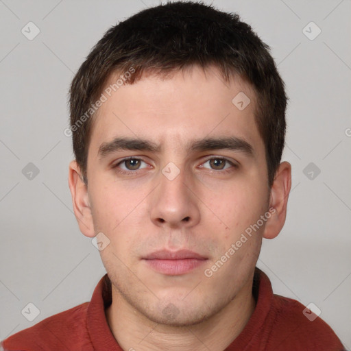 Neutral white young-adult male with short  brown hair and brown eyes