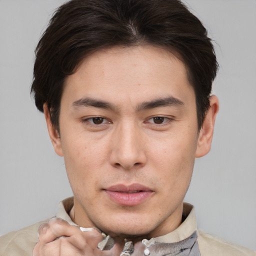 Neutral white young-adult male with short  brown hair and brown eyes