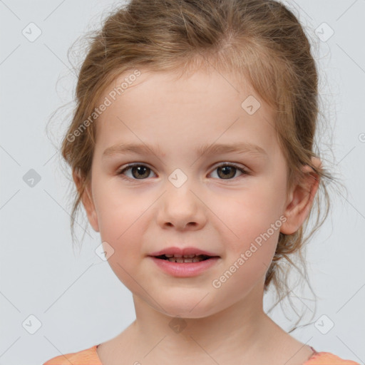 Joyful white child female with medium  brown hair and brown eyes