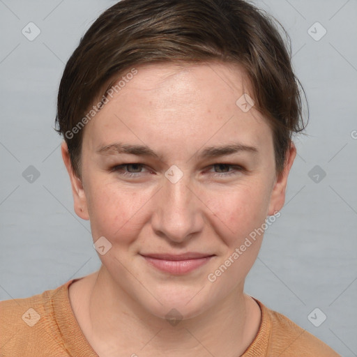 Joyful white young-adult female with short  brown hair and grey eyes