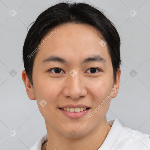 Joyful asian young-adult male with short  brown hair and brown eyes