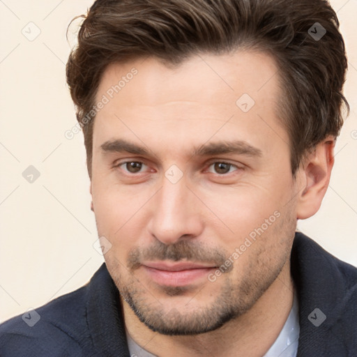 Joyful white young-adult male with short  brown hair and brown eyes