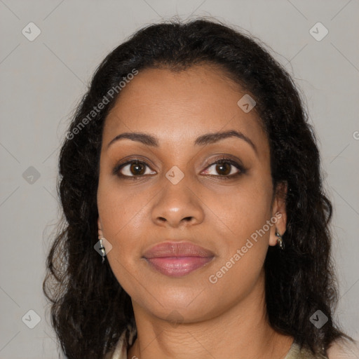 Joyful black young-adult female with long  brown hair and brown eyes