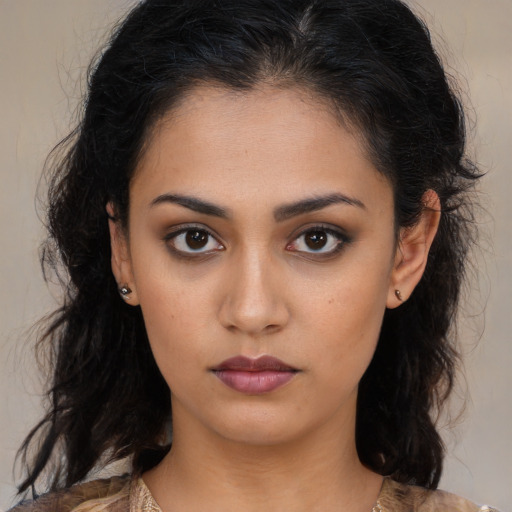 Neutral latino young-adult female with medium  brown hair and brown eyes