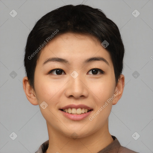 Joyful asian young-adult female with short  black hair and brown eyes