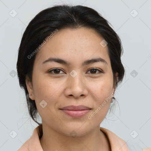 Joyful latino young-adult female with medium  brown hair and brown eyes