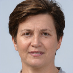 Joyful white adult female with short  brown hair and brown eyes