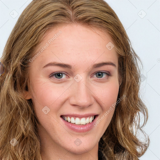 Joyful white young-adult female with long  brown hair and green eyes