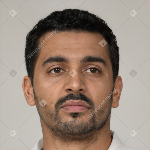 Neutral latino young-adult male with short  black hair and brown eyes