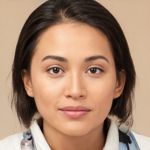 Joyful white young-adult female with medium  brown hair and brown eyes