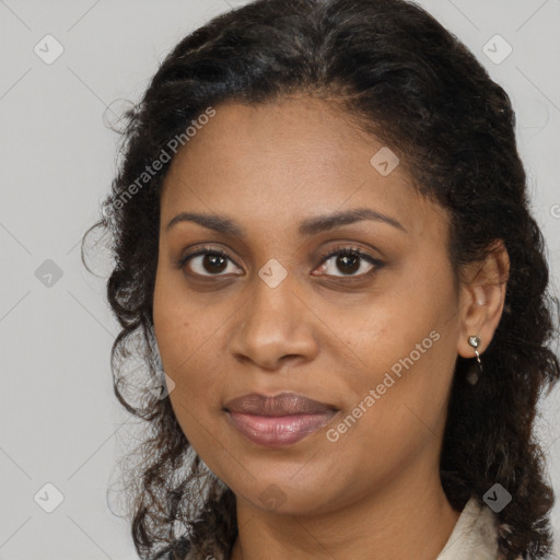 Joyful black young-adult female with medium  brown hair and brown eyes