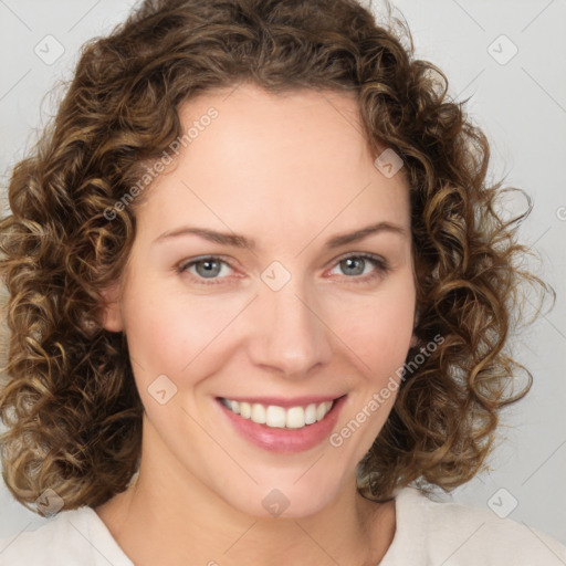 Joyful white young-adult female with medium  brown hair and green eyes