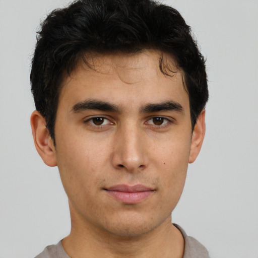 Neutral asian young-adult male with short  brown hair and brown eyes