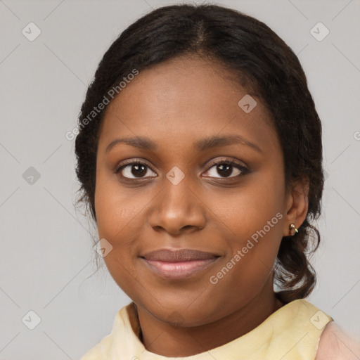 Joyful black young-adult female with medium  brown hair and brown eyes