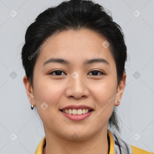 Joyful asian young-adult female with short  brown hair and brown eyes