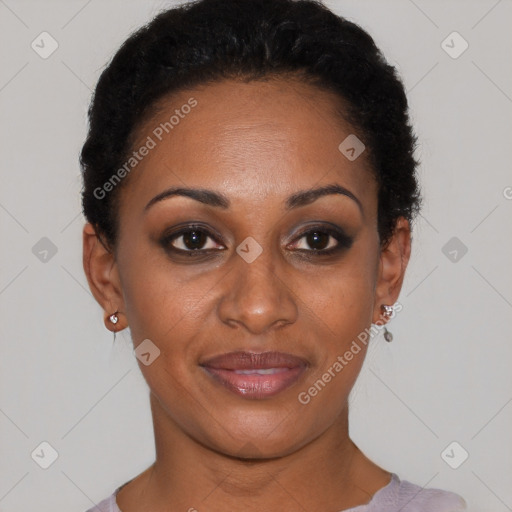 Joyful black young-adult female with short  black hair and brown eyes