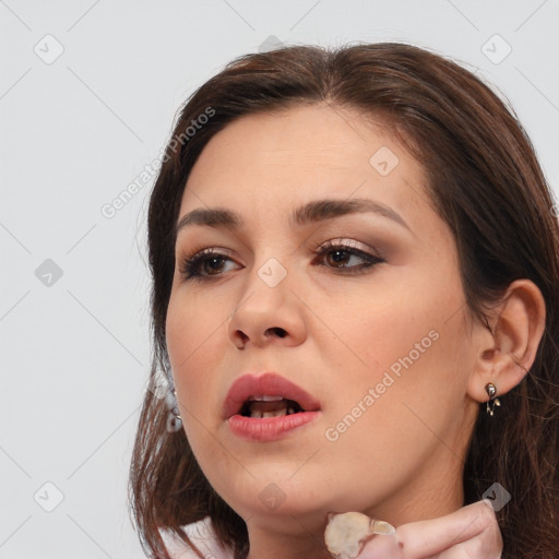 Joyful white young-adult female with medium  brown hair and brown eyes