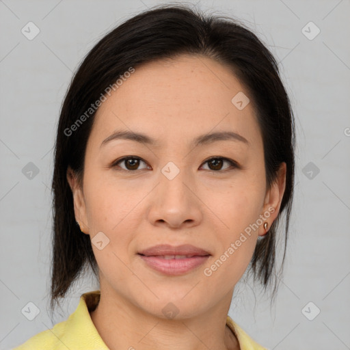 Joyful asian young-adult female with medium  brown hair and brown eyes