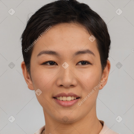 Joyful asian young-adult female with short  brown hair and brown eyes