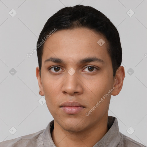 Neutral latino young-adult male with short  black hair and brown eyes