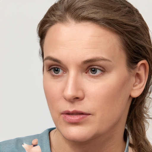 Neutral white young-adult female with medium  brown hair and grey eyes