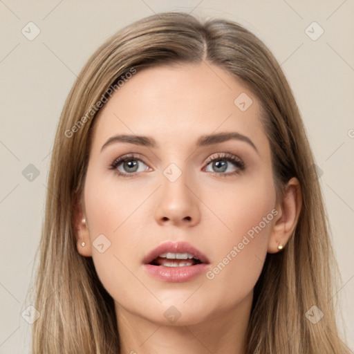 Neutral white young-adult female with long  brown hair and brown eyes