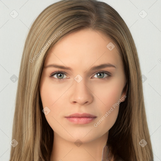 Neutral white young-adult female with long  brown hair and brown eyes