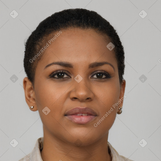 Joyful black young-adult female with short  brown hair and brown eyes