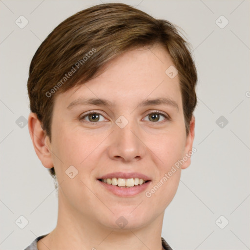 Joyful white young-adult female with short  brown hair and grey eyes