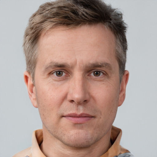 Neutral white adult male with short  brown hair and brown eyes