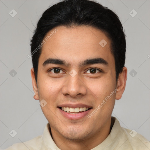 Joyful latino young-adult male with short  brown hair and brown eyes