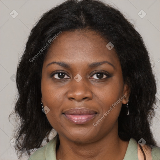 Joyful black young-adult female with medium  brown hair and brown eyes