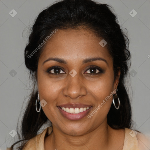 Joyful black young-adult female with long  brown hair and brown eyes