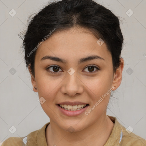 Joyful latino young-adult female with short  brown hair and brown eyes