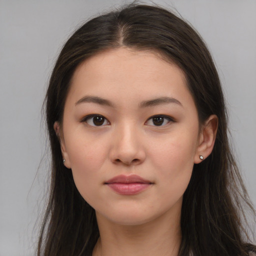 Neutral asian young-adult female with long  brown hair and brown eyes