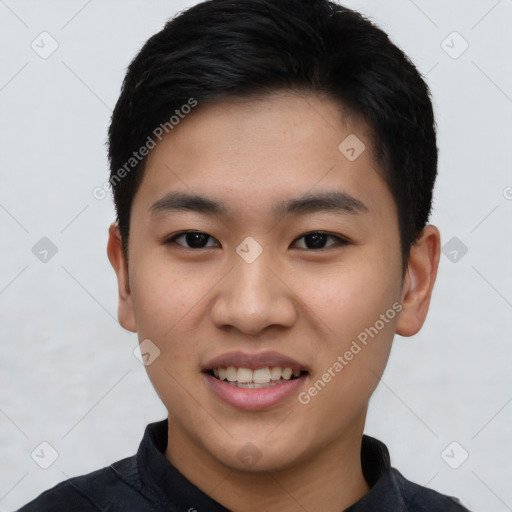 Joyful asian young-adult male with short  black hair and brown eyes