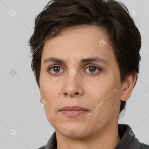 Neutral white adult female with short  brown hair and brown eyes