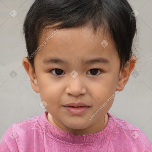 Joyful white child male with short  brown hair and brown eyes