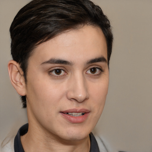 Joyful white young-adult male with medium  brown hair and brown eyes