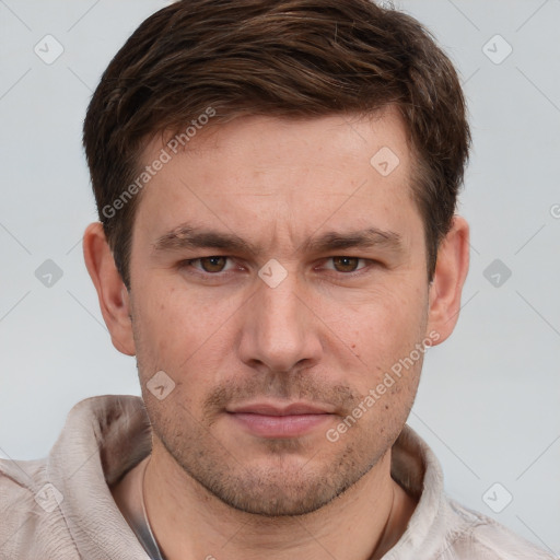 Neutral white adult male with short  brown hair and grey eyes