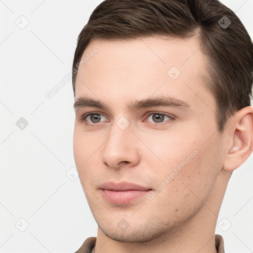 Neutral white young-adult male with short  brown hair and brown eyes