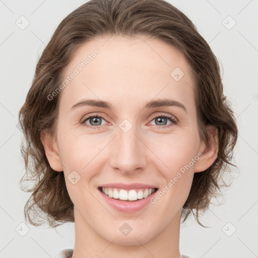 Joyful white young-adult female with medium  brown hair and green eyes